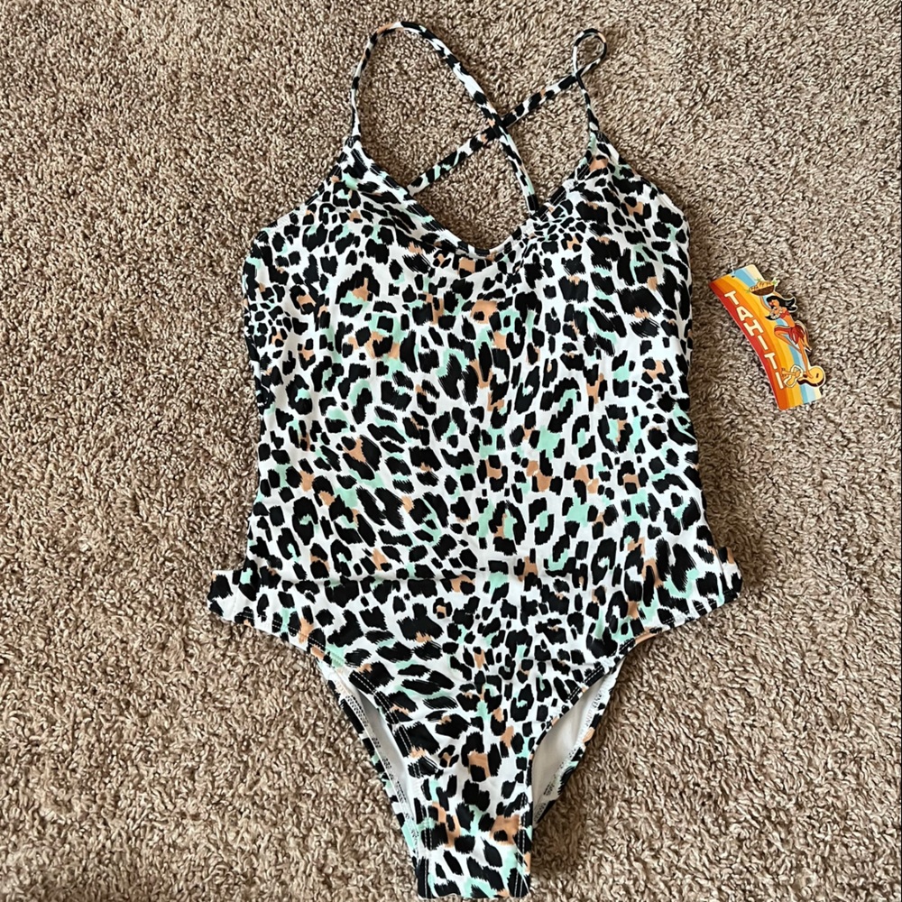 Woman’s one piece swim suit.